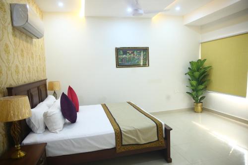 Gulberg Suitesにあるベッド