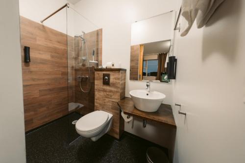Koupelna v ubytování Hotel Vos