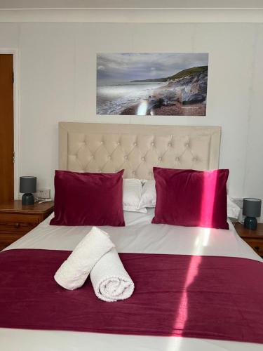 Ένα ή περισσότερα κρεβάτια σε δωμάτιο στο Berry Hotel