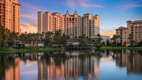 a view of a city with tall buildings and a lake at Wyndham Grand Orlando Resort Bonnet Creek in Orlando