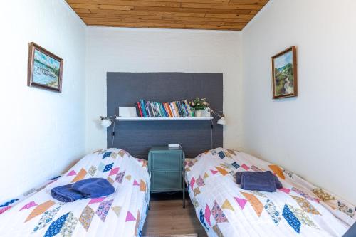 Postel nebo postele na pokoji v ubytování Agger Holidays