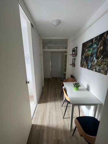 a living room with a table and a dining room at Plitvice Studio Sara in Plitvička Jezera