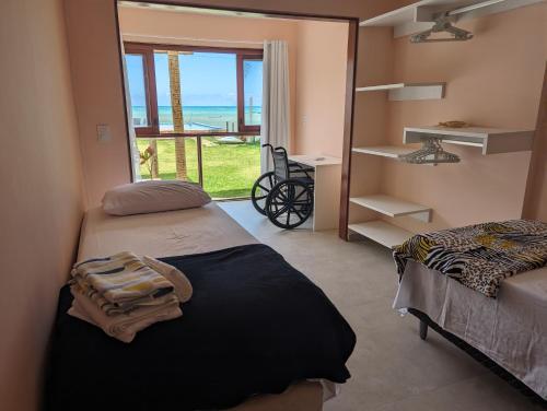 Katil atau katil-katil dalam bilik di Slater's House - Casa de praia em frente ao mar