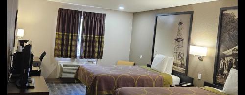 Katil atau katil-katil dalam bilik di Super 8 by Wyndham Buffalo