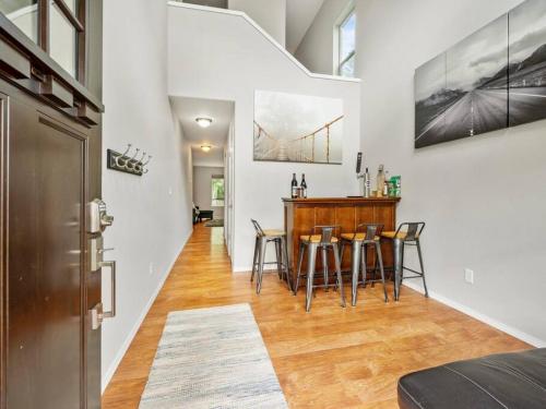 a dining room with a bar in a house at Troutdale Treasure - Spacious 3BR, 3 Bath Home near Edgefield in Troutdale