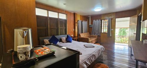 Postel nebo postele na pokoji v ubytování HomDoiIntr Farmstay ฮ่อมดอยอินทร์ ฟาร์มสเตย์