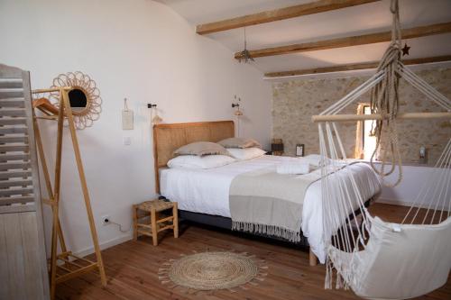 Postel nebo postele na pokoji v ubytování Bessire Chambres & table d'hôtes