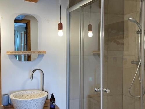 a bathroom with a sink and a shower at Hof Sonnenmeer - Ostsee - nachhaltig - ökologisch & wunderschön in Prasdorf