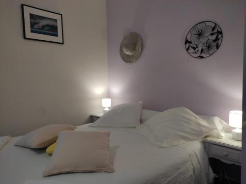 Katil atau katil-katil dalam bilik di B&B Amphitryon