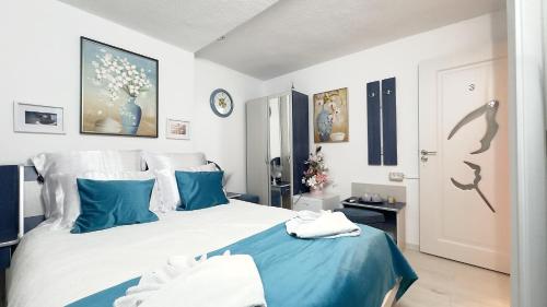 Ένα ή περισσότερα κρεβάτια σε δωμάτιο στο Casa Mina