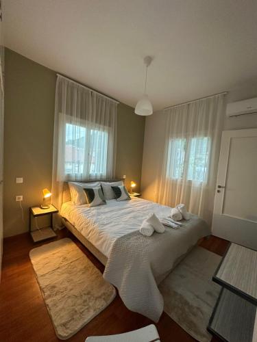 Llit o llits en una habitació de Happy Home