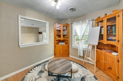 a dining room with a table and a window at Dry Ridge Rental Home with Hot Tub and Game Room! in Dry Ridge