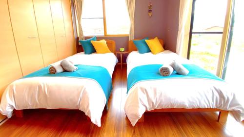 מיטה או מיטות בחדר ב-COZY HOUSE HAKUBA - Vacation STAY 71391v
