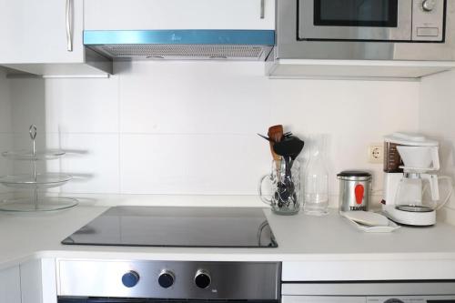 Η κουζίνα ή μικρή κουζίνα στο Confort 10 en Gros