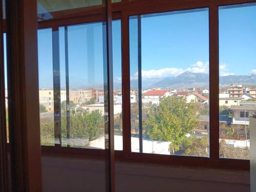 a view of a city from a window at Alvi apartment in Shkodër