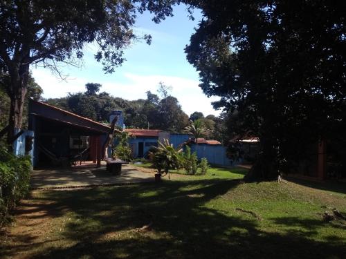 a view of the yard of a house at Pousada Canto dos Passaros in Chapada dos Guimarães