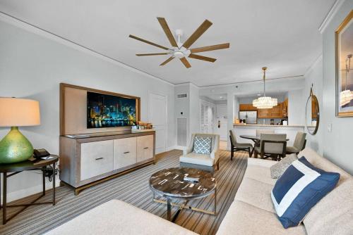 a living room with a couch and a tv at Stylish Suite to Have a Great Stay! in Miami
