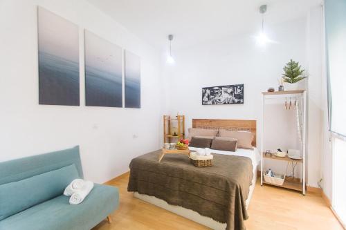 Tempat tidur dalam kamar di Apartamento Picasso