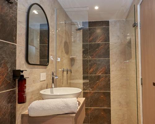 Koupelna v ubytování Elemont Hotel