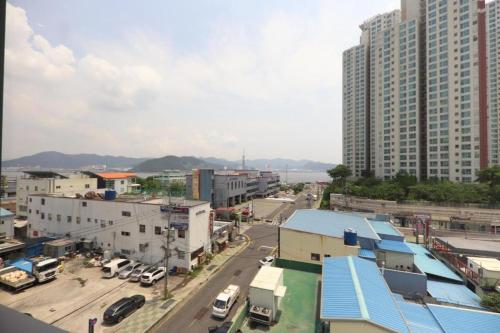 a view of a city with buildings and a street at Brooks Business in Changwon