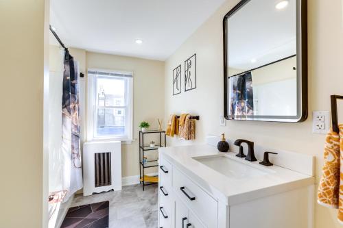 a bathroom with a sink and a mirror at Philadelphia Vacation Rental about 4 Mi to Center City in Philadelphia