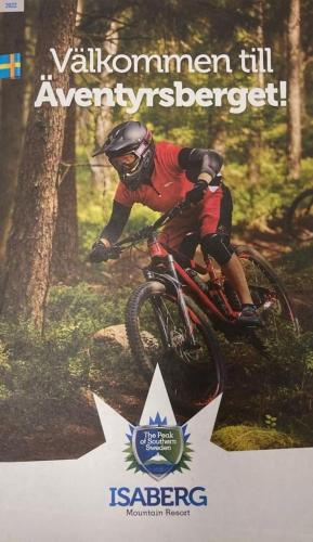 a man riding a mountain bike on a trail at Fint boende nära Isaberg Mountain Resort in Grimsås