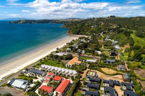 an aerial view of a resort next to the beach at Onetangi Beach Stays Studio 2 - Coast & Country in Onetangi