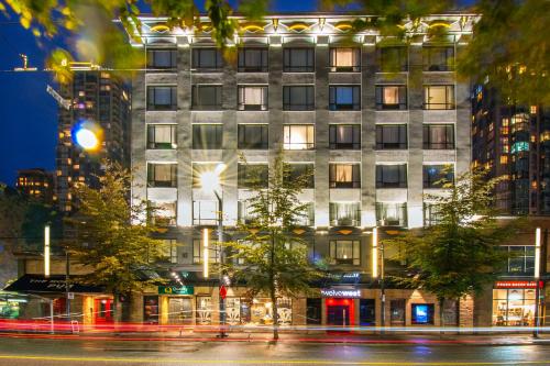 a building with lights in front of a street at Quality Inn & Suites in Vancouver