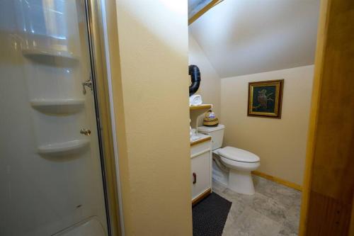 a small bathroom with a toilet and a sink at Snowbasin + Powder Mountain + Spa + Eden in Eden