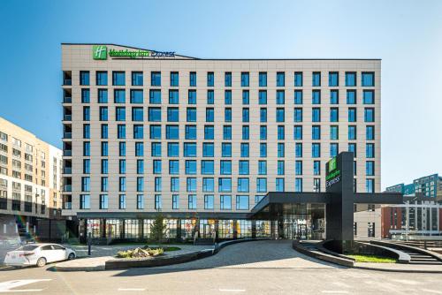 a large office building with a lot of windows at Holiday Inn Express - Astana - Turan by IHG in Astana