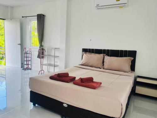 Ένα ή περισσότερα κρεβάτια σε δωμάτιο στο Rest Mind House