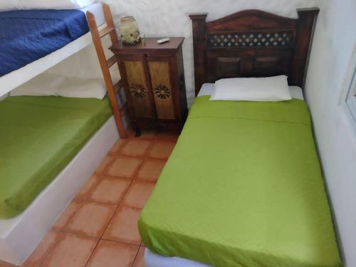 Postel nebo postele na pokoji v ubytování Chalet Rincón Tortuga 4 habitaciones para 18 a 20 personas Máximo