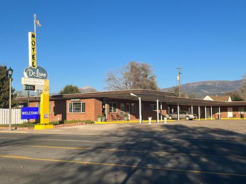 an empty parking lot in front of a gas station at DeLano Motel & RV Park Beaver in Beaver