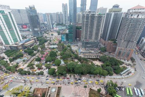 an aerial view of a busy city with traffic at Chongqing Forest Design B&B in Chongqing