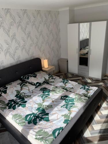 Postel nebo postele na pokoji v ubytování Haus Nummer Vier