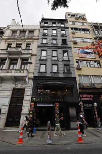 a group of people walking in front of a building at Ravello Suites Taksim in Istanbul