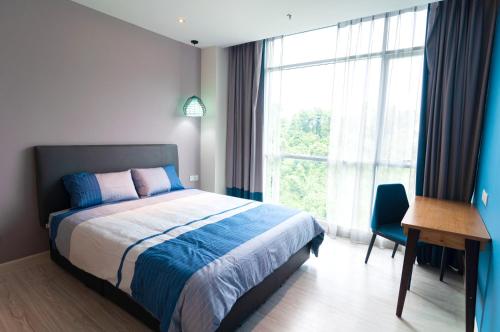 Кровать или кровати в номере My Suite Home 2 Bedroom Suite