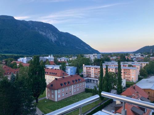 a city with buildings and mountains in the background at Ferienwohnung Alpenpanorama Bad Reichenhall in Bad Reichenhall