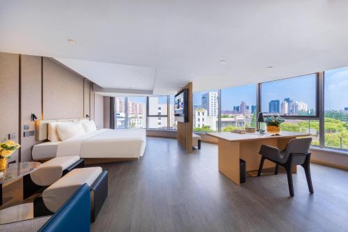 Postel nebo postele na pokoji v ubytování Atour Hotel Shanghai Xinzhuang CBD