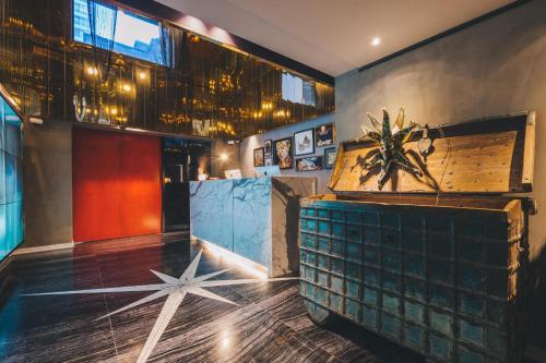 a restaurant lobby with a star on the floor at The Drama in Shanghai