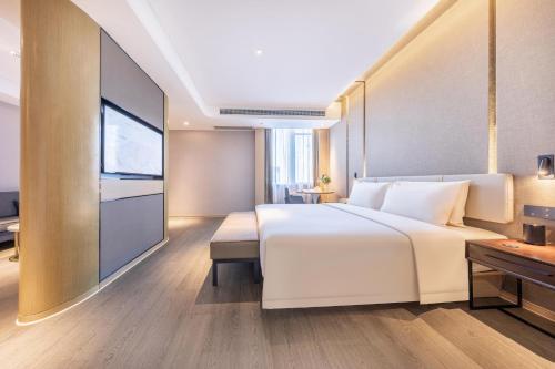 Cama o camas de una habitación en Atour Hotel Nanjing Qidi Street Qinlin Science and Technology Park