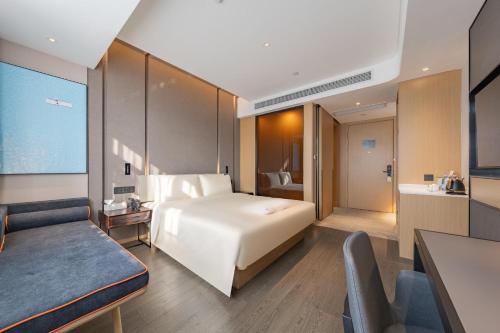 Katil atau katil-katil dalam bilik di Atour Hotel Shanghai Pudong Airport Chuansha Station