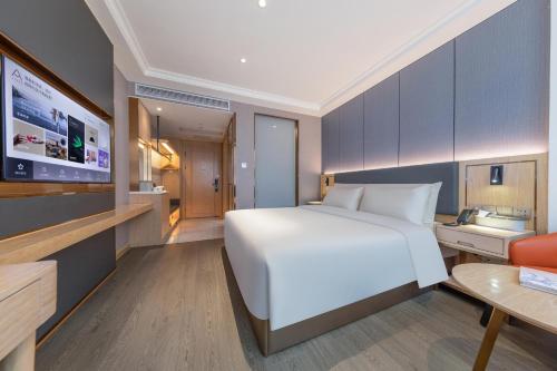 Μια τηλεόραση ή/και κέντρο ψυχαγωγίας στο Atour X Hotel Shenzhen Guanlan Shanshui Pastoral