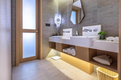 Ένα μπάνιο στο Atour Hotel Jinan Grand View Garden