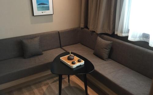 Posezení v ubytování Atour Hotel Dalian Zhongshan Square