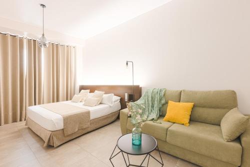 Un ou plusieurs lits dans un hébergement de l'établissement AACR Hotel Monteolivos