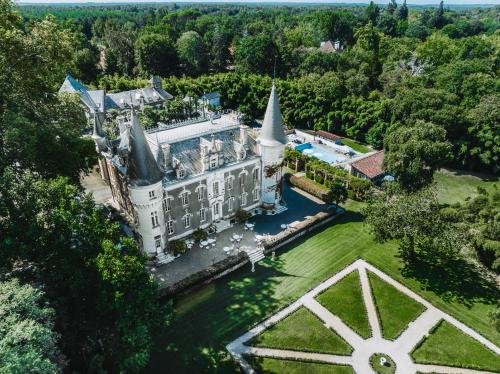 an aerial view of a mansion with a large building at Château Belle Epoque - Chambres d'Hôtes & Gîtes in Linxe