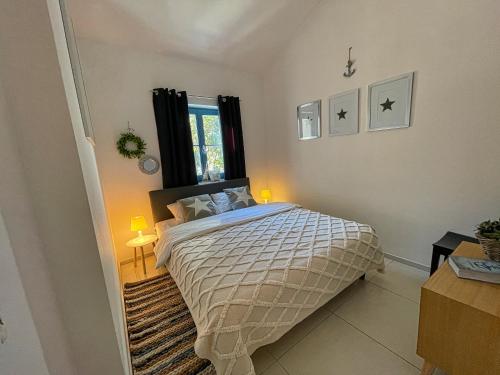 Postel nebo postele na pokoji v ubytování Villas Adagio