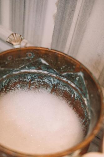 a close up of a toilet bowl filled with milk at Heybe Hotel & Spa in Goreme
