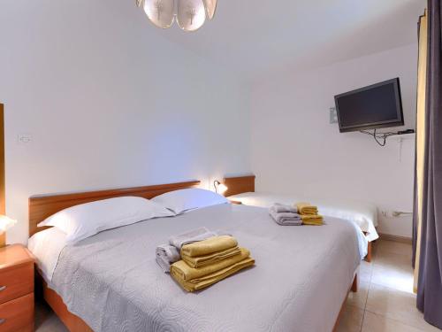 Postel nebo postele na pokoji v ubytování Apartment Alba-2 by Interhome